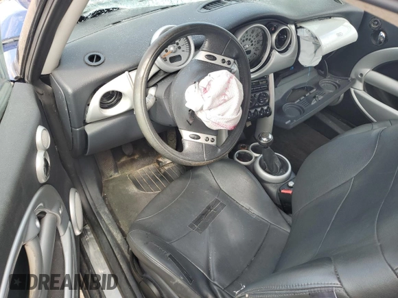 2003 MINI Hardtop with VIN WMWRC334X3TC38665, listed as a Copart auction lot 58563345 with Not provided miles and Non repairable. Bid and sale history available at DreamBid. Image 8.
