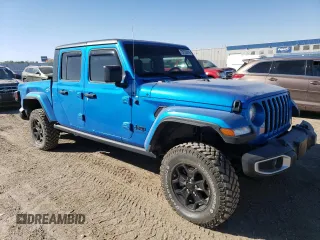 2022 Jeep Gladiator Willys with VIN 1C6JJTAM3NL132056, listed as a Copart auction lot 75723014 with 36,195 mi miles and Salvage title. Bid and sale history available at DreamBid. Image 4.