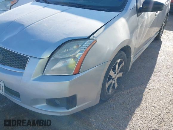 2012 Nissan Sentra SR z VIN 3N1AB6AP8CL646765, wystawiony jako IAAI lot #42283774 z przebiegiem 208 433 mil mil oraz . Historia ofert i sprzedaży dostępna na DreamBid. Obrazek 6.
