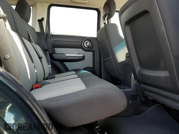 2010 Dodge Nitro SXT z VIN 1D4PT5GK2AW131913, wystawiony jako Copart lot #42711015 z przebiegiem 177 637 mil mil oraz Szkoda całkowita • Salvage title. Historia ofert i sprzedaży dostępna na DreamBid. Obrazek 11.