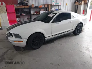 2007 Ford Mustang Deluxe with VIN 1ZVFT80N575259508, listed as a IAAI auction lot 41569259 with 164,315 mi miles. Bid and sale history available at carsss.com. Image 2.