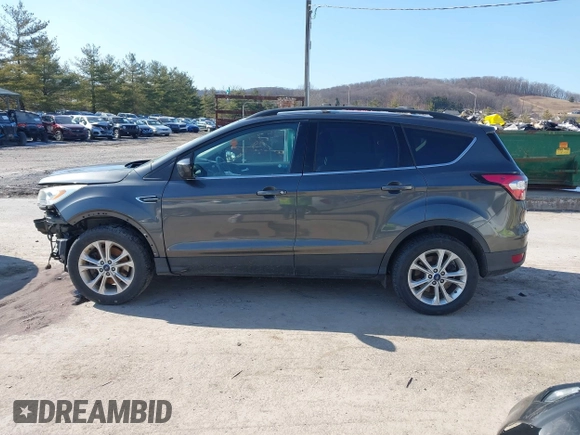 2017 Ford Escape SE with VIN 1FMCU9G99HUD03370, listed as a IAAI auction lot 41700809 with 136,575 mi miles. Bid and sale history available at carsss.com. Image 15.