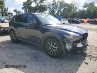 2018 Mazda CX-5 Grand Touring with VIN JM3KFBDMXJ0350499, listed as a Copart auction lot 63475745 with 119,642 mi miles and Salvage title. Bid and sale history available at DreamBid. Image 4.