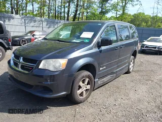 2013 Dodge Grand Caravan SXT with VIN 2C4RDGCG4DR636798, listed as a IAAI auction lot 42240550 with 96,100 mi miles and . Bid and sale history available at DreamBid. Image 2.