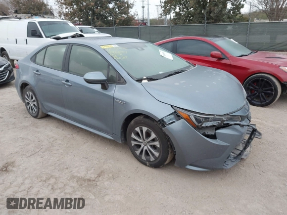 2021 Toyota Corolla Hybrid LE with VIN JTDEAMDE8MJ002711, listed as a IAAI auction lot 41498716 with 98,559 mi miles. Bid and sale history available at carsss.com. Image 1.