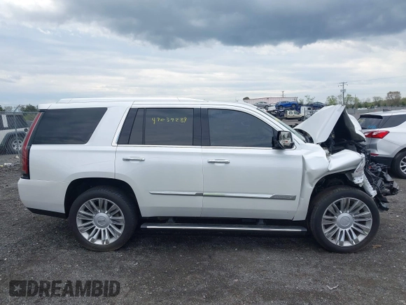 2016 Cadillac Escalade Platinum z VIN 1GYS4DKJ2GR316025, wystawiony jako IAAI lot #42039284 z przebiegiem Nie podano mil oraz . Historia ofert i sprzedaży dostępna na DreamBid. Obrazek 12.