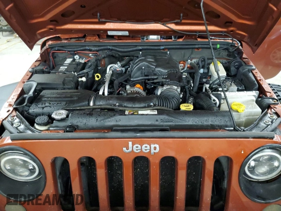 2014 Jeep Wrangler Sport with VIN 1C4AJWAG7EL197285, listed as a Copart auction lot 63451105 with 141,547 mi miles and Salvage title. Bid and sale history available at DreamBid. Image 12.
