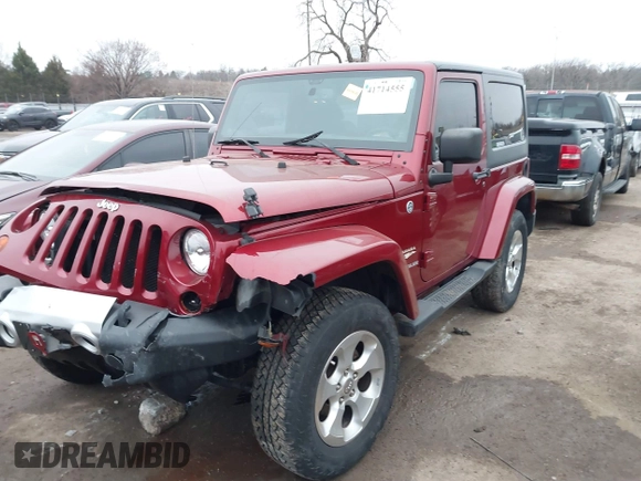 2013 Jeep Wrangler Sahara with VIN 1C4AJWBG7DL501146, listed as a IAAI auction lot 41714555 with 69,324 mi miles and . Bid and sale history available at DreamBid. Image 2.