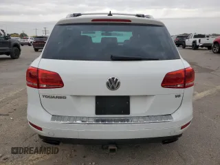 2014 Volkswagen Touareg Sport with VIN WVGEF9BP3ED005921, listed as a Copart auction lot 77372514 with 156,753 mi miles and Salvage Title. Bid and sale history available at DreamBid. Image 6.
