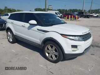 2015 Land Rover Range Rover Evoque Pure Premium z VIN SALVR2BG0FH964683, wystawiony jako IAAI lot #42016766 z przebiegiem 94 942 mil mil oraz . Historia ofert i sprzedaży dostępna na DreamBid. Obrazek 1.