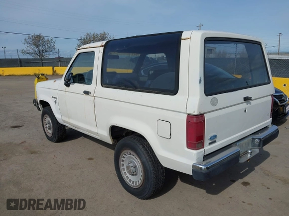 1986 Ford Bronco z VIN 1FMCU14T0GUC51692, wystawiony jako IAAI lot #41982392 z przebiegiem 509 734 mil mil oraz . Historia ofert i sprzedaży dostępna na DreamBid. Obrazek 3.