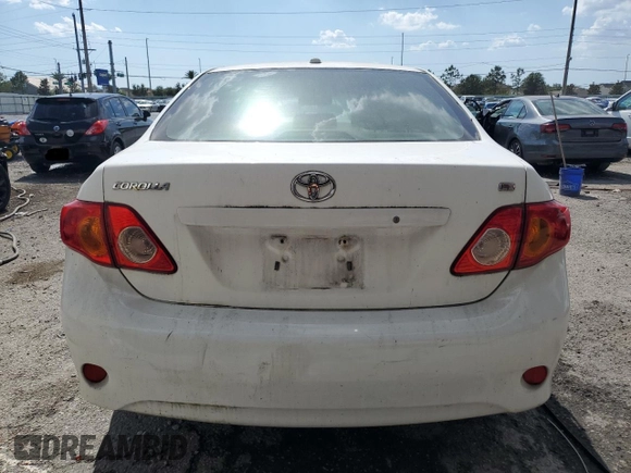 2009 Toyota Corolla with VIN JTDBL40E699047335, listed as a Copart auction lot 54758925 with 212,801 mi miles and Salvage Title. Bid and sale history available at carsss.com. Image 6.