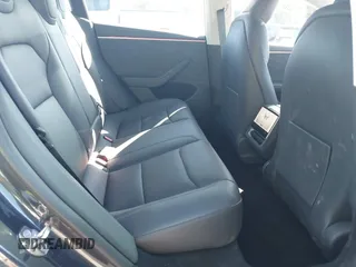 2024 Tesla Model 3 Long Range z VIN 5YJ3E1EB2RF740291, wystawiony jako IAAI lot #42124138 z przebiegiem 36 452 mil mil oraz . Historia ofert i sprzedaży dostępna na DreamBid. Obrazek 8.