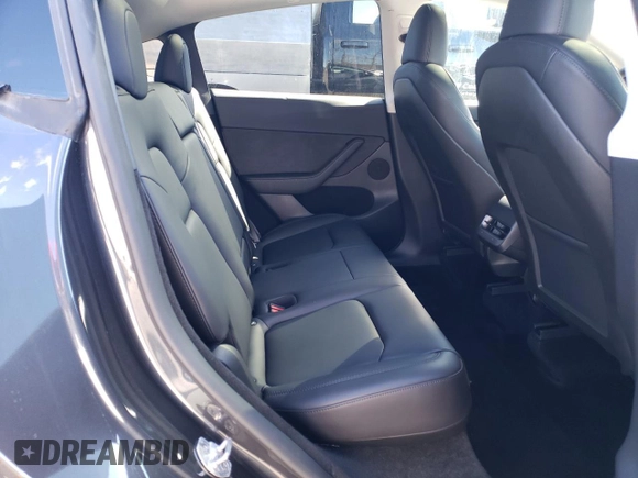 2024 Tesla Model Y with VIN 7SAYGDED3RF114643, listed as a Copart auction lot 56557075 with 3,021 mi miles and Salvage Title. Bid and sale history available at DreamBid. Image 10.