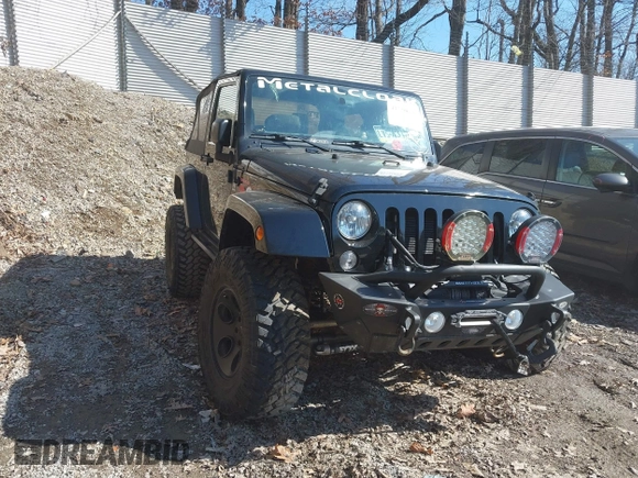2015 Jeep Wrangler Sahara с VIN 1C4AJWBG7FL703858, выставлен на аукционе IAAI как лот 41720656 с пробегом 110 671 миль миль и . История ставок и продаж доступна на DreamBid. Изображение 22.