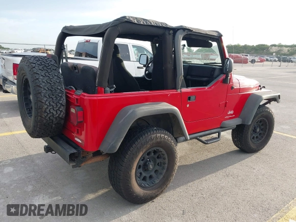 2003 Jeep Wrangler SE z VIN 1J4FA29113P323655, wystawiony jako IAAI lot #42704498 z przebiegiem 189 763 mil mil oraz . Historia ofert i sprzedaży dostępna na DreamBid. Obrazek 4.