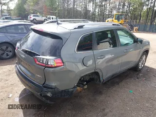 2020 Jeep Cherokee Latitude Plus with VIN 1C4PJMLB1LD608591, listed as a IAAI auction lot 41833275 with 90,838 mi miles and . Bid and sale history available at DreamBid. Image 4.