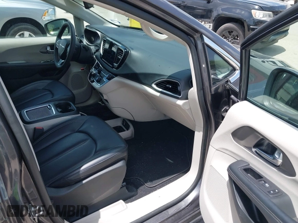 2023 Chrysler Pacifica Touring L with VIN 2C4RC1BG6PR590302, listed as a IAAI auction lot 42451369 with 72,097 mi miles and . Bid and sale history available at DreamBid. Image 5.