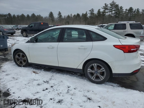 2018 Ford Focus SE with VIN 1FADP3F2XJL219528, listed as a Copart auction lot 46587325 with 143,896 mi miles and Salvage Title. Bid and sale history available at carsss.com. Image 2.
