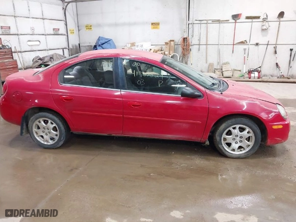 2003 Dodge Neon SXT with VIN 1B3ES56C03D189956, listed as a IAAI auction lot 41962824 with 51,872 mi miles. Bid and sale history available at carsss.com. Image 13.