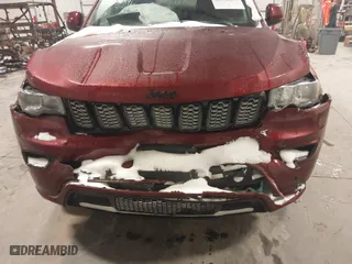 2018 Jeep Grand Cherokee Laredo E with VIN 1C4RJFAG9JC436803, listed as a IAAI auction lot 41572437 with 106,941 mi miles. Bid and sale history available at carsss.com. Image 12.