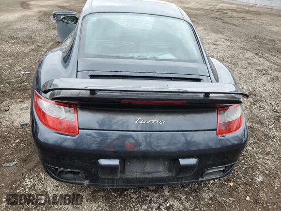 2007 Porsche 911 Turbo z VIN WP0AD29977S785458, wystawiony jako Copart lot #78957064 z przebiegiem 108 780 mil mil oraz Czysty tytuł • Clean title. Historia ofert i sprzedaży dostępna na DreamBid. Obrazek 6.