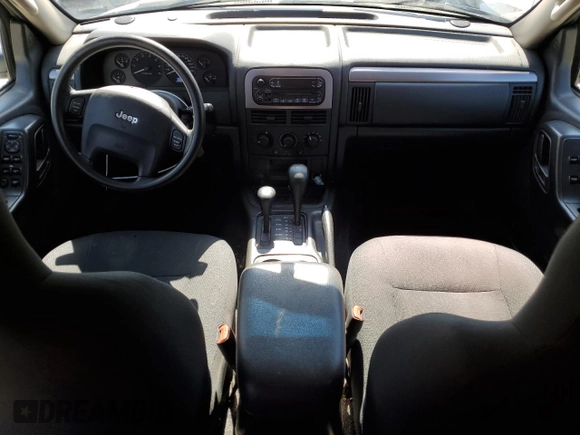 2003 Jeep Grand Cherokee Laredo with VIN 1J4GW48S83C517330, listed as a Copart auction lot 52765415 with 108,920 mi miles and Salvage title. Bid and sale history available at DreamBid. Image 8.