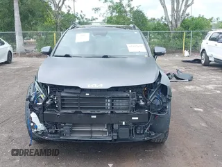 2023 Kia Sportage SX-Prestige with VIN KNDPXCAG7P7071365, listed as a IAAI auction lot 42247639 with 21,509 mi miles and . Bid and sale history available at DreamBid. Image 13.