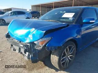 2014 Scion tC with VIN JTKJF5C78E3079618, listed as a IAAI auction lot 41107330 with 112,105 mi miles. Bid and sale history available at carsss.com. Image 6.