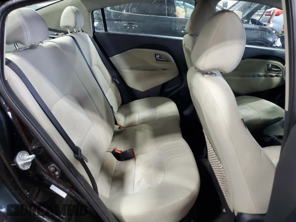 2013 Kia Rio LX z VIN KNADM4A38D6283981, wystawiony jako Copart lot #60595875 z przebiegiem 144 817 mil mil oraz Nie do naprawy • Non repairable. Historia ofert i sprzedaży dostępna na DreamBid. Obrazek 10.