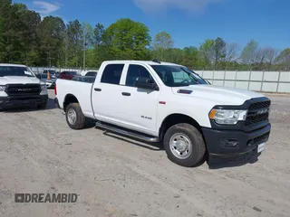 2022 Ram 2500 Tradesman z VIN 3C6UR4CJ8NG154694, wystawiony jako IAAI lot #42008437 z przebiegiem 102 623 mil mil oraz . Historia ofert i sprzedaży dostępna na DreamBid. Obrazek 1.