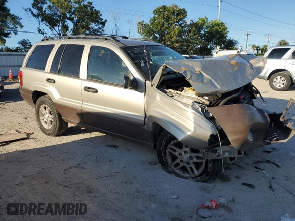 2003 Jeep Grand Cherokee Laredo z VIN 1J4GX48N63C509220, wystawiony jako Copart lot #72730964 z przebiegiem 95 216 mil mil oraz Szkoda całkowita • Salvage title. Historia ofert i sprzedaży dostępna na DreamBid. Obrazek 4.