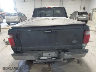 2003 Ford Ranger XL Fleet with VIN 1FTZR45EX3PA60520, listed as a IAAI auction lot 41591797 with 205,040 mi miles. Bid and sale history available at carsss.com. Image 16.