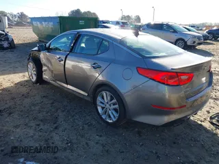 2014 Kia Optima SXL Turbo with VIN 5XXGR4A65EG327515, listed as a IAAI auction lot 41876799 with 115,533 mi miles and . Bid and sale history available at DreamBid. Image 3.