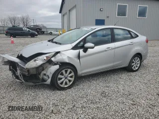 2012 Ford Fiesta SE with VIN 3FADP4BJ5CM170288, listed as a Copart auction lot 49471605 with 104,851 mi miles and Salvage Title. Bid and sale history available at carsss.com. Image 1.