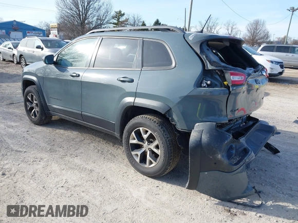 2014 Jeep Cherokee Trailhawk z VIN 1C4PJMBS5EW147579, wystawiony jako IAAI lot #41781543 z przebiegiem 155 751 mil mil oraz . Historia ofert i sprzedaży dostępna na DreamBid. Obrazek 3.