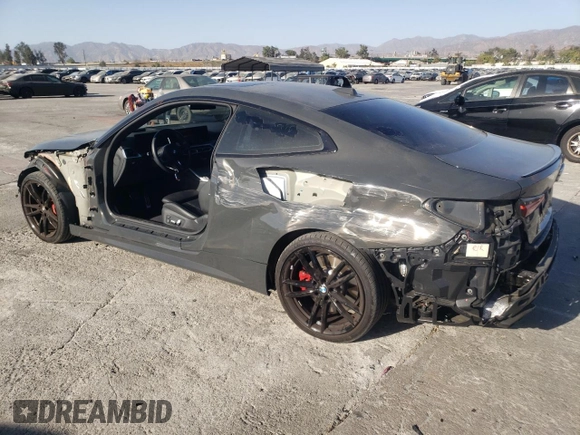 2024 BMW 4 Series M440i with VIN WBA83AP01RCP30000, listed as a Copart auction lot 77032014 with 14,671 mi miles and Salvage Title. Bid and sale history available at carsss.com. Image 2.