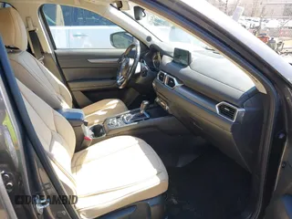 2017 Mazda CX-5 Touring with VIN JM3KFBCL2H0203497, listed as a IAAI auction lot 41860782 with 65,482 mi miles. Bid and sale history available at carsss.com. Image 5.