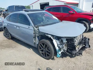 2022 Honda Civic Sport Touring z VIN 19XFL1H82NE003000, wystawiony jako IAAI lot #42020685 z przebiegiem 46 740 mil mil oraz . Historia ofert i sprzedaży dostępna na DreamBid. Obrazek 1.