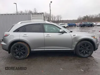 2006 Infiniti FX z VIN JNRAS08U46X102648, wystawiony jako IAAI lot #41468610 z przebiegiem 213 553 mil mil oraz . Historia ofert i sprzedaży dostępna na DreamBid. Obrazek 13.