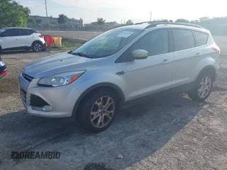 2013 Ford Escape SEL z VIN 1FMCU9HX8DUC26143, wystawiony jako IAAI lot #42815698 z przebiegiem 255 242 mil mil oraz . Historia ofert i sprzedaży dostępna na DreamBid. Obrazek 2.