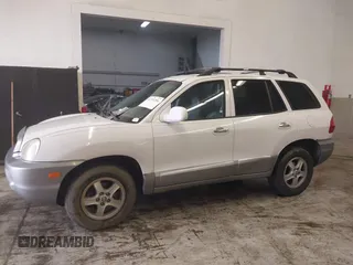 2004 Hyundai Santa Fe GLS with VIN KM8SC13E44U797943, listed as a IAAI auction lot 41731356 with 184,139 mi miles. Bid and sale history available at carsss.com. Image 14.