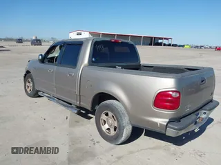 2002 Ford F-150 XLT with VIN 1FTRW07672KB31448, listed as a IAAI auction lot 41226836 with 265,234 mi miles. Bid and sale history available at carsss.com. Image 3.