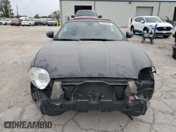 2010 Jaguar XK with VIN SAJWA4GBXALB36341, listed as a Copart auction lot 68307584 with 76,951 mi miles and Salvage Title. Bid and sale history available at carsss.com. Image 5.