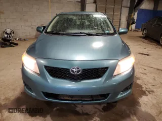 2010 Toyota Corolla with VIN JTDBU4EE7A9121808, listed as a Copart auction lot 57801605 with 114,778 mi miles and Salvage title. Bid and sale history available at DreamBid. Image 5.