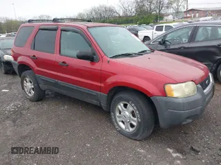 2004 Ford Escape XLT with VIN 1FMCU03114KA54144, listed as a IAAI auction lot 41908703 with 238,791 mi miles. Bid and sale history available at carsss.com. Image 1.
