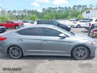 2018 Hyundai Elantra Sport with VIN KMHD04LB0JU597002, listed as a IAAI auction lot 41983087 with 95,583 mi miles. Bid and sale history available at carsss.com. Image 13.
