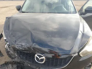 2014 Mazda CX-5 Touring with VIN JM3KE2CY9E0336218, listed as a Copart auction lot 49213255 with 124,749 mi miles and Salvage Title. Bid and sale history available at carsss.com. Image 12.