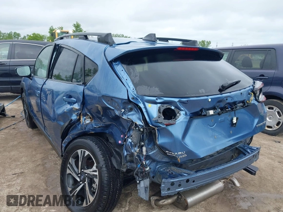 2024 Subaru Crosstrek Premium z VIN JF2GUADC6RH338290, wystawiony jako IAAI lot #42341194 z przebiegiem 10 379 mil mil oraz . Historia ofert i sprzedaży dostępna na DreamBid. Obrazek 6.