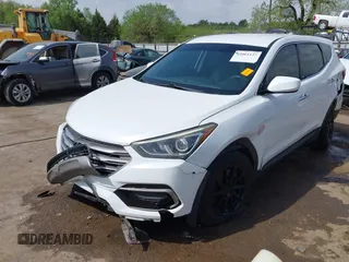 2017 Hyundai Santa Fe 2.4L z VIN 5XYZTDLB3HG439072, wystawiony jako IAAI lot #42061127 z przebiegiem 145 864 mil mil oraz . Historia ofert i sprzedaży dostępna na DreamBid. Obrazek 2.